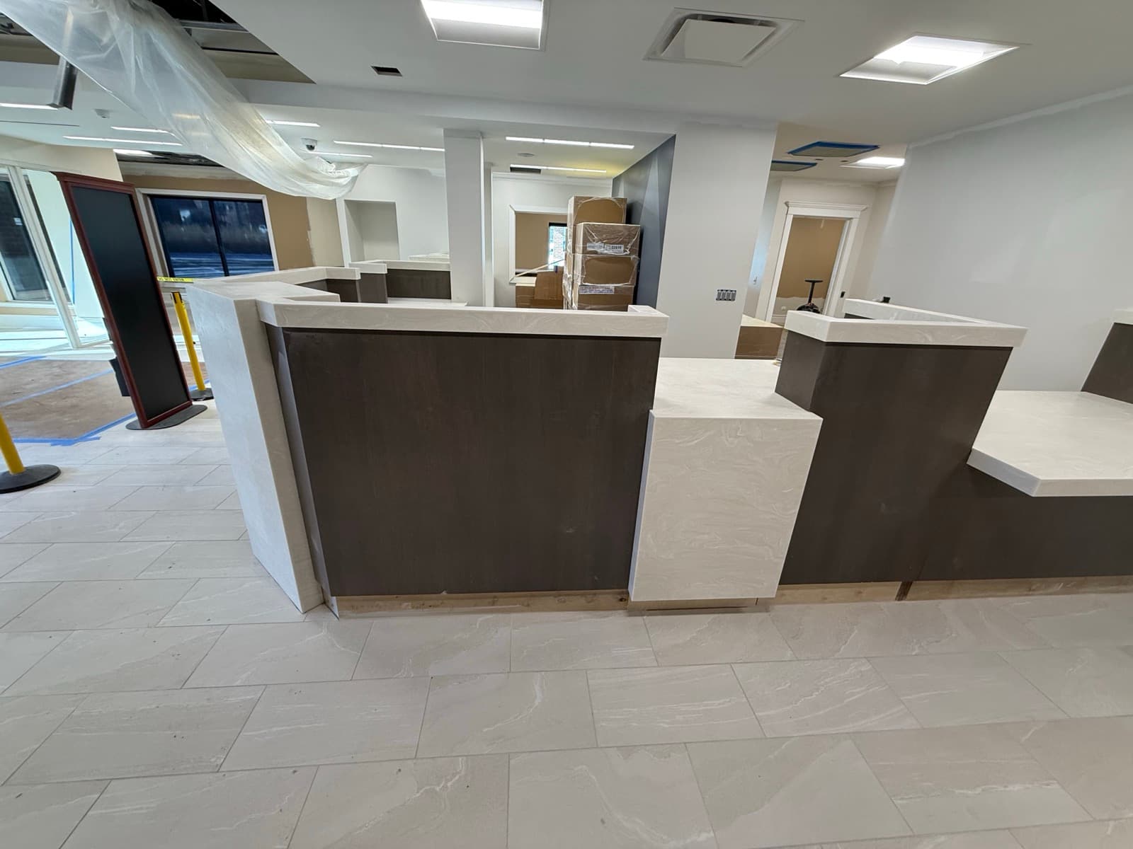 Bank remodel — custom teller counters with stone countertops